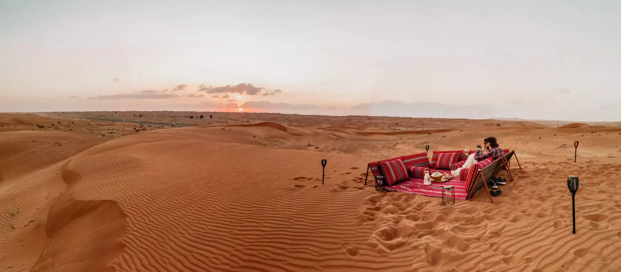 A private Bedouin majlis nestled among the golden desert dunes
